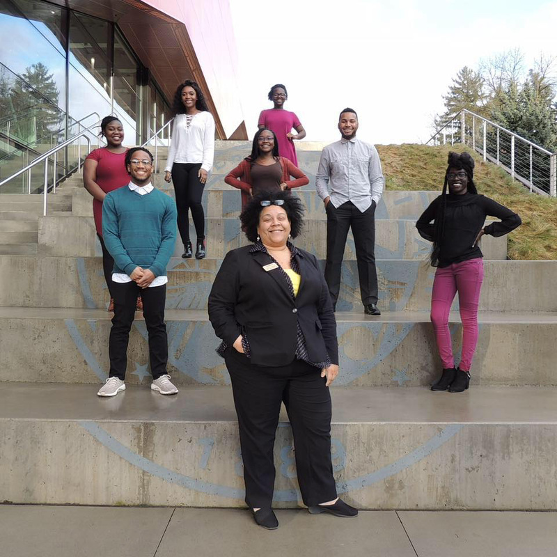Black Student Union (BSU) advisor, Jessica Samuels, and student officers standing outside the Integrated Research and Innovation Center (IRIC).