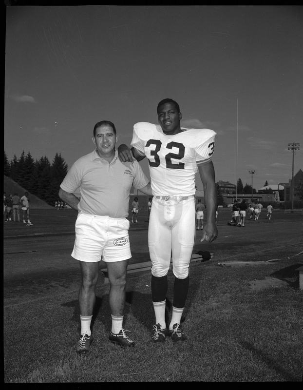 Outstanding Vandal football player Ray McDonald with Coach Musseau.