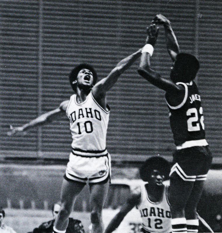 Tommy James facing off an opponent during a game.