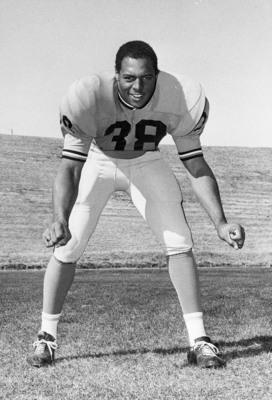 Jesse Craig poses in his football uniform.
