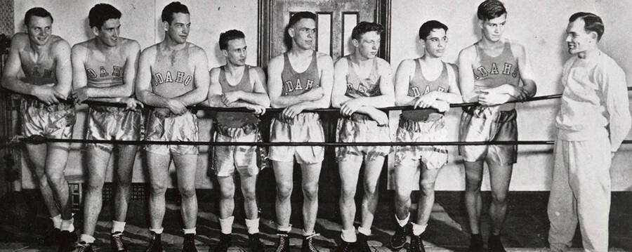 1942 University of Idaho boxing squad - Vic Berllus, Warren Briggs, Chace Anderson, Watkins Kershaw, Bill Williams, George Unternahrer, Gordon Ross, Tom Wells, Coach Bob Knox. 