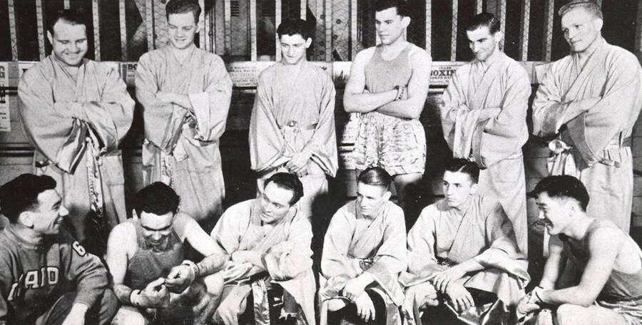1937-1938  University of Idaho boxing squad - Front row: Coach Louie August, Pete Cenarrusa, Milt Osterhaut, Captain Ralph Miller, Patsy Fitzpatrick, Max Hosada,  Back row: Ross Sundberg, Jim Nixon, Bud Benoit, Bill Morrow, Joe Fallini, Carl Killian.