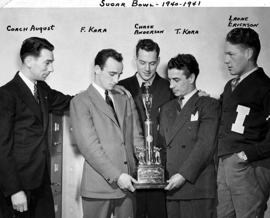 University of Idaho boxing squad Sugar Bowl Champions - L-r: Coach Louie August, Frank Kara, Chase Anderson, Ted Kara, Laune Erickson. Duplicate of MG5388_33 but with players labeled.