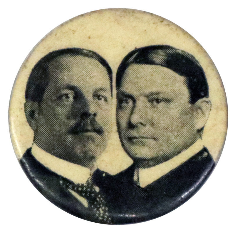 Round button with portraits of Frank W. Higgins and M. Linn Bruce.