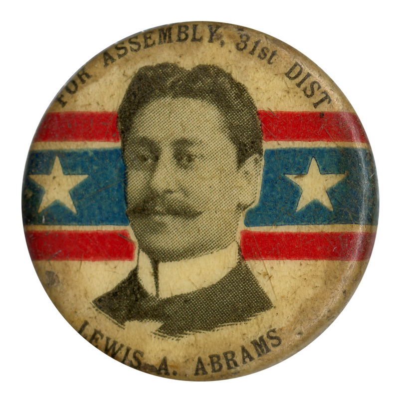Round, white button with a portrait of Lewis A. Abrams and the text: "For Assembly, 31st Dist. Lewis A. Abrams". 
