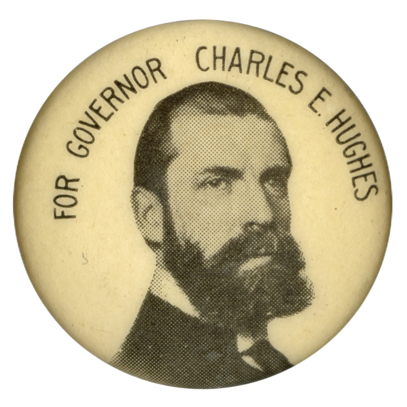 Round, white button with a black and white portrait of Charles E. Hughes, and black text reading "For Governor Charles E. Hughes" along the top. 