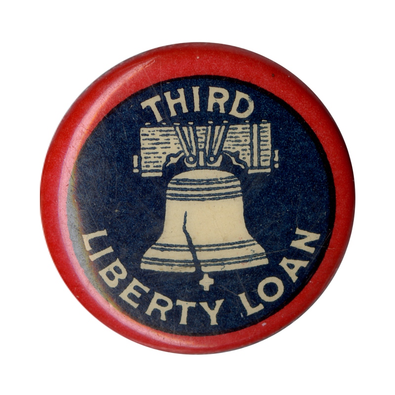 Round, blue button with a red border. A Liberty Bell sits at the center, with bold white text reading "Third LIberty Loan" surrounding the image.