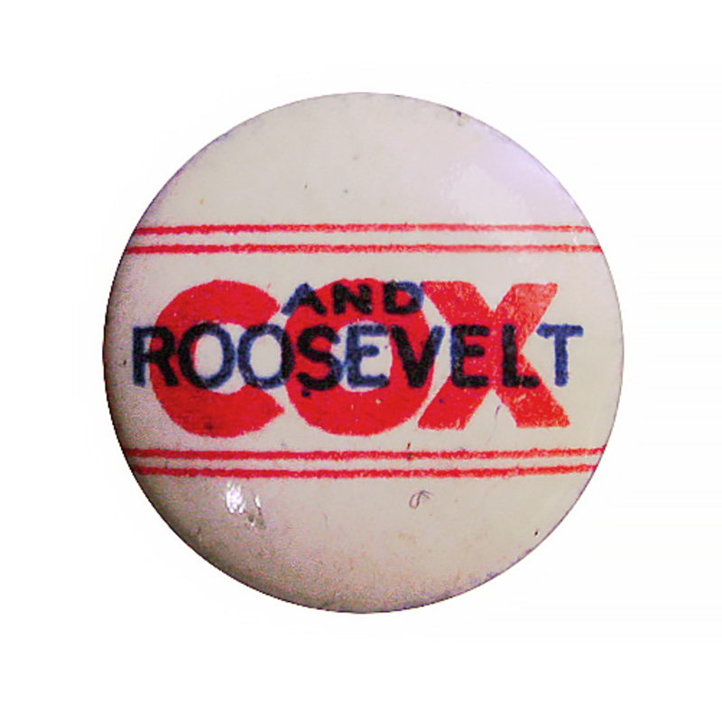 Round, white button with bold, red text reading "Cox" and blue text reading "And Roosevelt" over the top of "Cox".