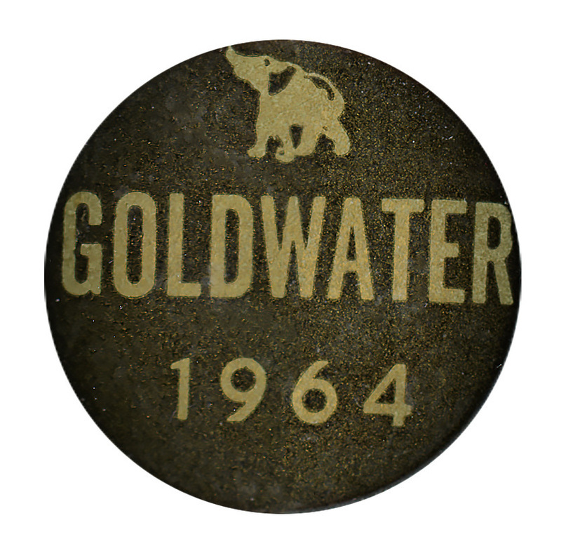 Round, black button with a gold image of an elephant and gold text reading "Goldwater 1964"