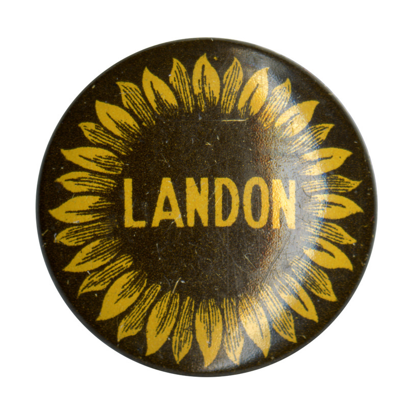 Round, brown button featuring a yellow sunflower with yellow text reading "Landon" in the center.