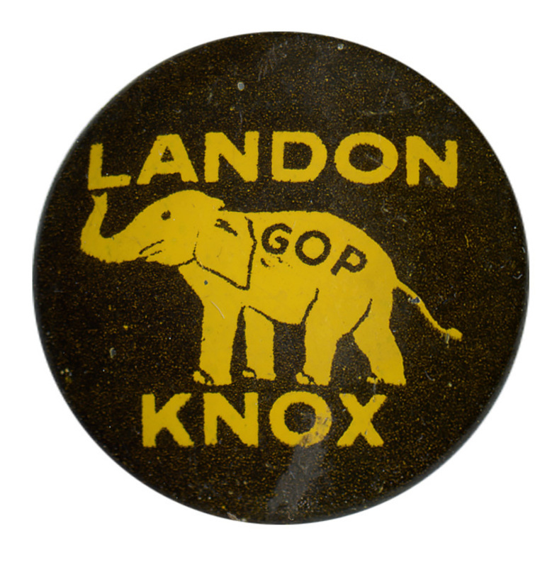 Round, brown button with a yellow-colored elephant with the letters "GOP" on the elephant's side, and yellow text reading "Landon, Knox" encircling the elephant. 