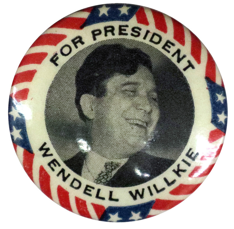 Round button with US flag accents as a border, and a black and white portrait of Wendell Willkie at the center. Black text reading "For President Wendell Willkie" encircles the portrait.