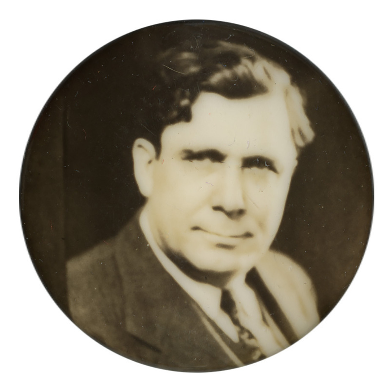 Round button with a black and white portrait of Wendell Willkie.