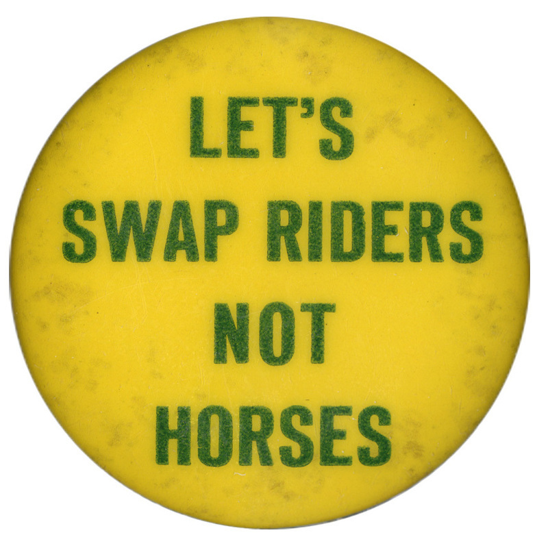 Round, yellow button with text reading "Let's Swap Riders not horses".