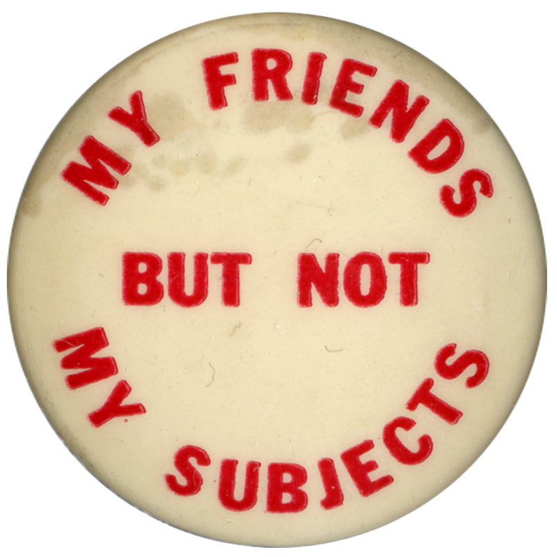 Round, white button with red text reading "My friends but not my subjects". 