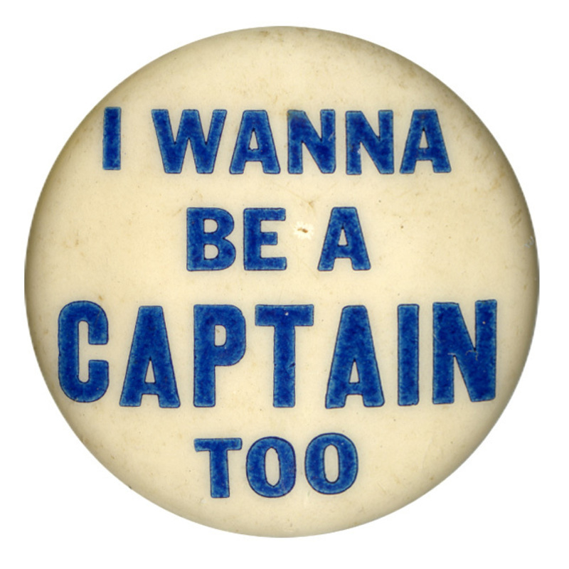 Round, white button with blue text reading "I wanna be a captain too".