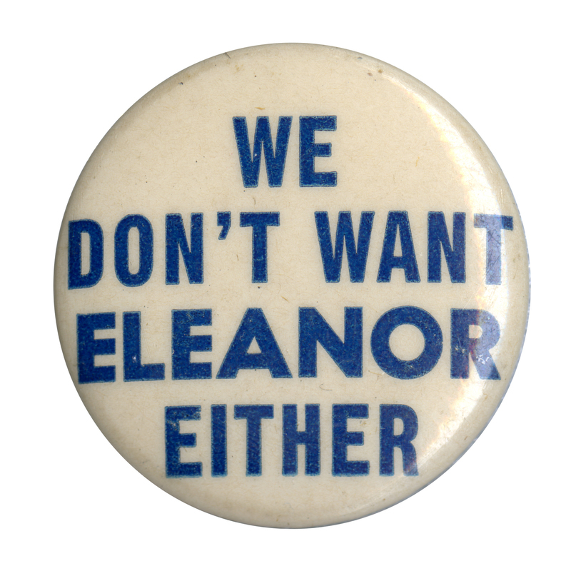 Round, white button with light blue text reading "We don't want Eleanor Either".