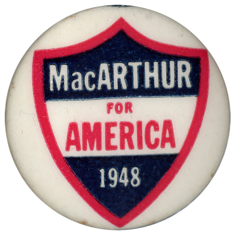 Round, white button with a shield design and text that reads "MacArthur for America 1948" in red and blue.