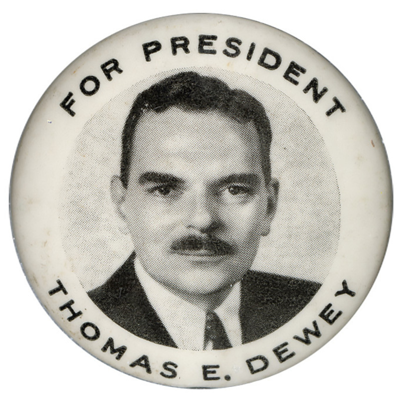 Round, white button with a black and white portrait of Thomas Dewey. Black text encircles the portrait and reads "For President Thomas E. Dewey". 