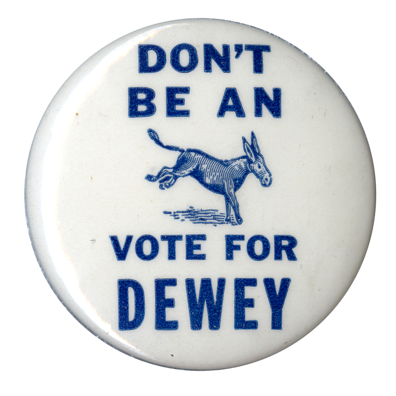 Round, white button with a graphic of a donkey, and blue text reading "Don't be an (image of donkey) vote for Dewey". 