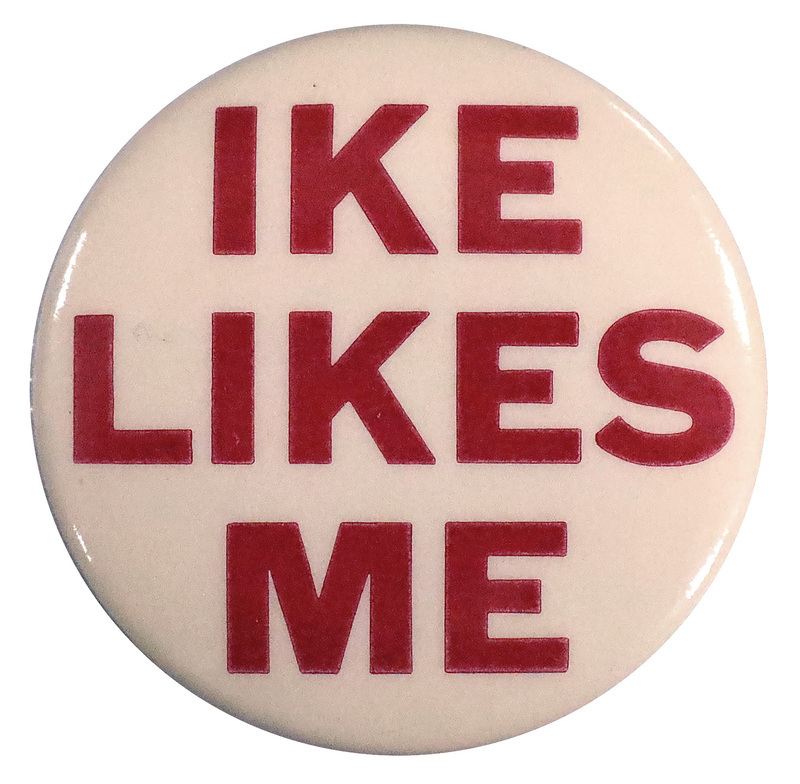 Round, white button with bold, red text that reads "Ike likes me". 