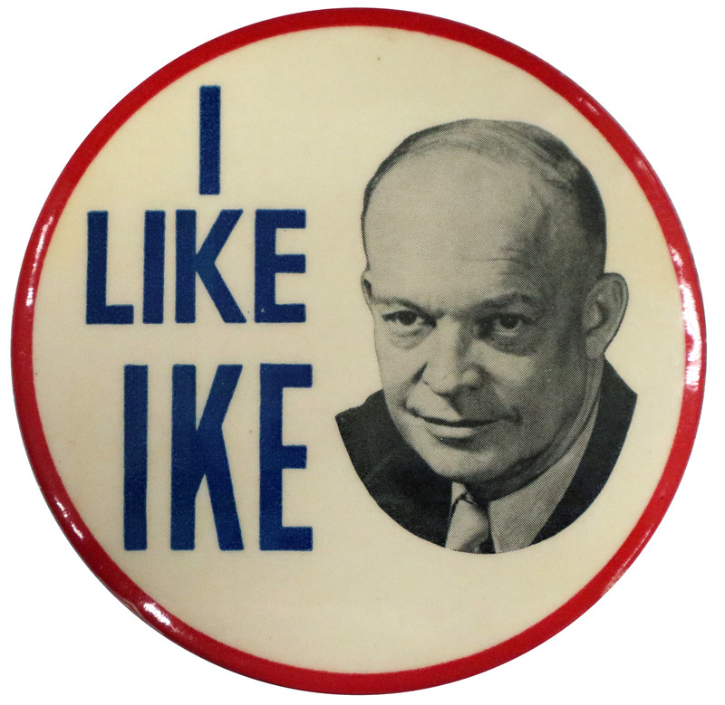 Round, white button with a thin red border and a grayscale portrait of Dwight D. Eisenhower. Blue text reads "I like Ike". 