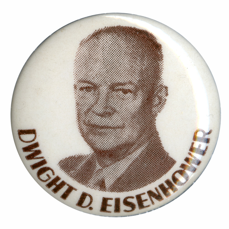 Round, off-white button with a grayscale portrait of Dwight D. Eisenhower. Dark text below the portrait reads "Dwight D. Eisenhower". 