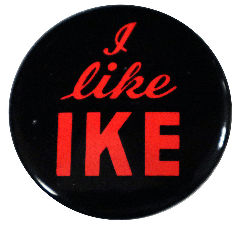Round, black button with bright red text that reads "I like Ike". 
