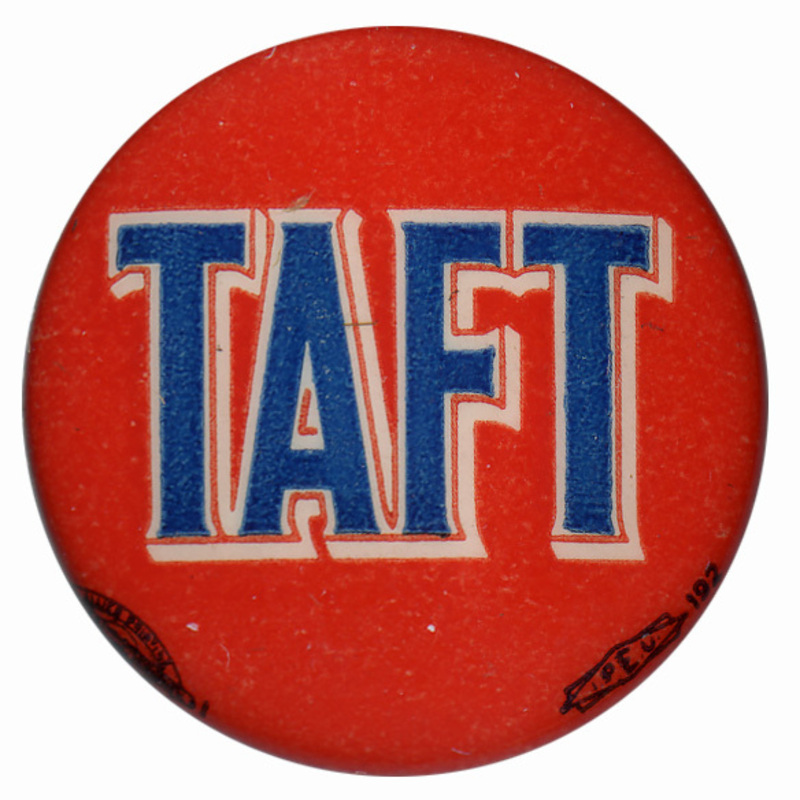 Round, red button with bold blue text that reads "Taft". 