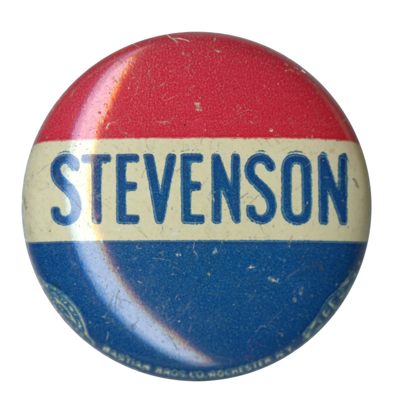 Round button with three horizontal stripes of red, white, and blue. Across the middle white stripe is blue text that reads "Stevenson". 