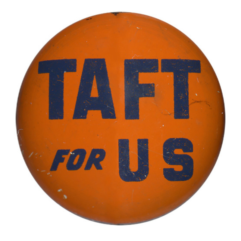 Round, orange button with blue text that reads "Taft for US". 