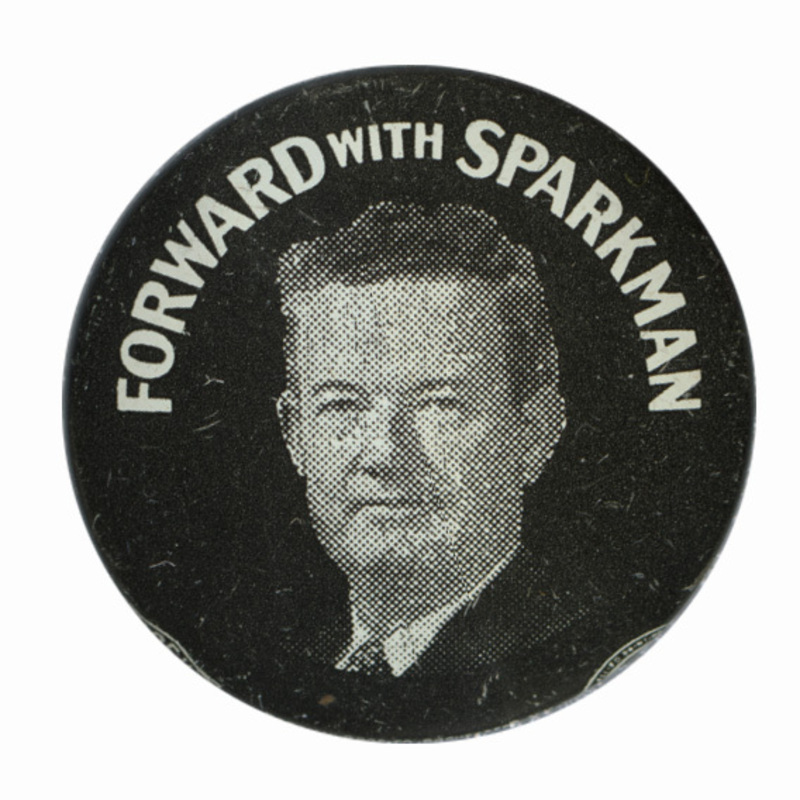 Round, black button with a grayscale portrait of John Sparkman. White text reads "Forward with Sparkman" above the portrait. 