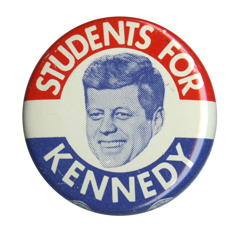 Round, white button with a red and white border, and a grayscale portrait of John F. Kennedy. White text reads "Students for Kennedy". 