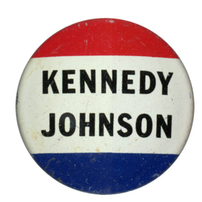 Round button with three horizontal stripes of red, white, and blue. Black text reads "Kennedy Johnson" across the white stripe. 