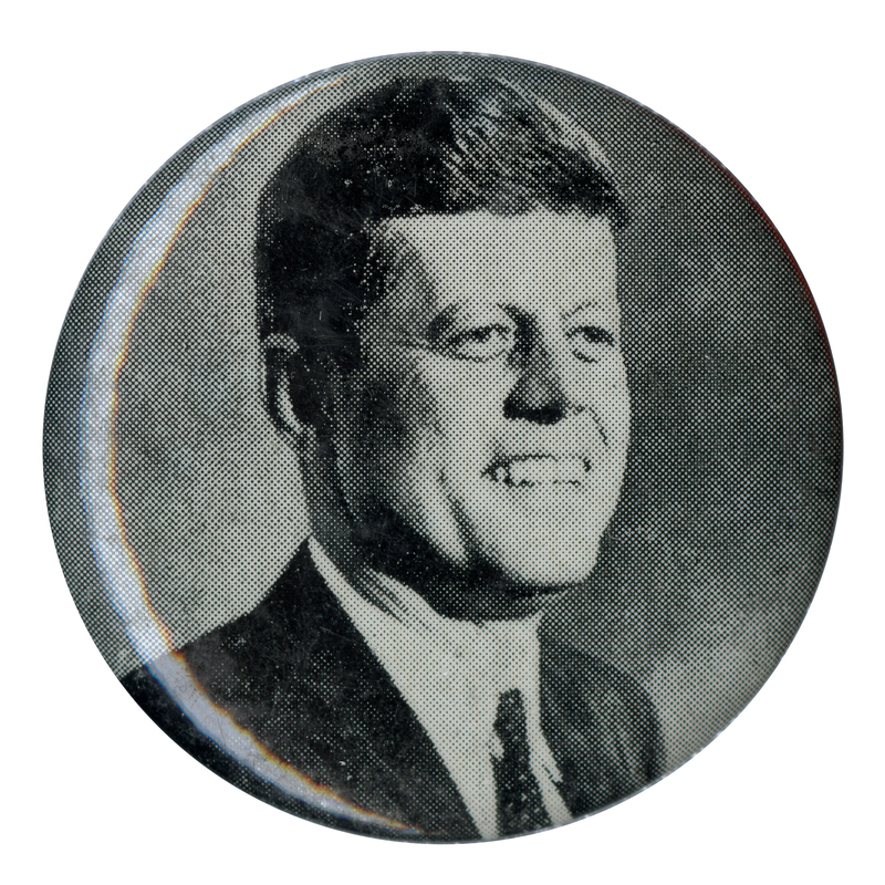 Round button with a grayscale portrait of John F. Kennedy.