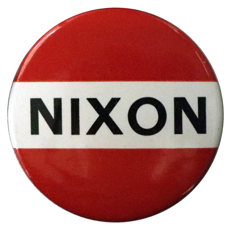 Round button with three horizontal stripes of red, white, and red. Black text across the white stripe reads "Nixon".