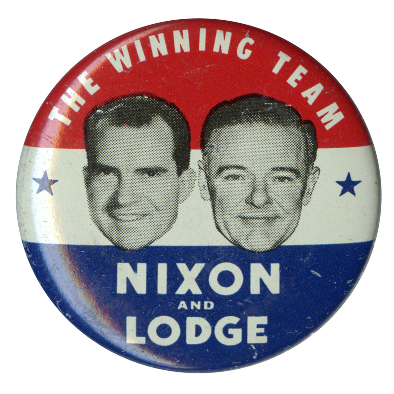 Round button with three stripes of red, white, and blue, and two grayscale portraits of Richard Nixon and Henry Cabot Lodge Jr. White text above and below the portraits reads "The Winning Team Nixon and Lodge". 