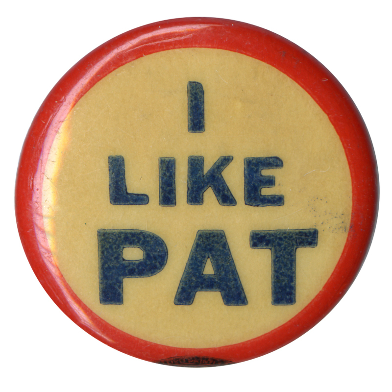 Round, off-white button with a red border. Blue text reads "I like Pat". 
