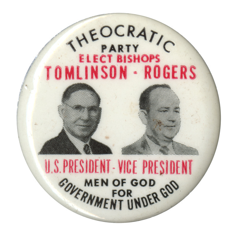 Round, white button with two grayscale portraits of Homer Tomlinson and William Rogers. Black and red text reads "Theocratic Party Elect Bishops Tomlinson Rogers U.S. President Vice President Men of God for Government Under God". 