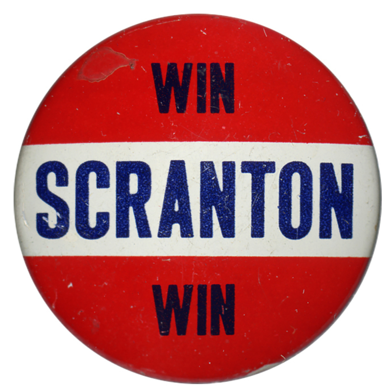 Round button with three horizontal stripes of red, white, and red. Dark text reads "Win Scranton Win" across all three of the stripes. 