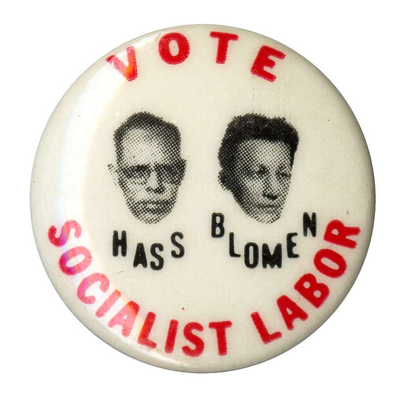 Round, white button with two grayscale portraits of Eric Hass and Henning Blomen at the center. Red and black text reads "Vote Socialist Labor Hass Blomen" above and below the portraits. 