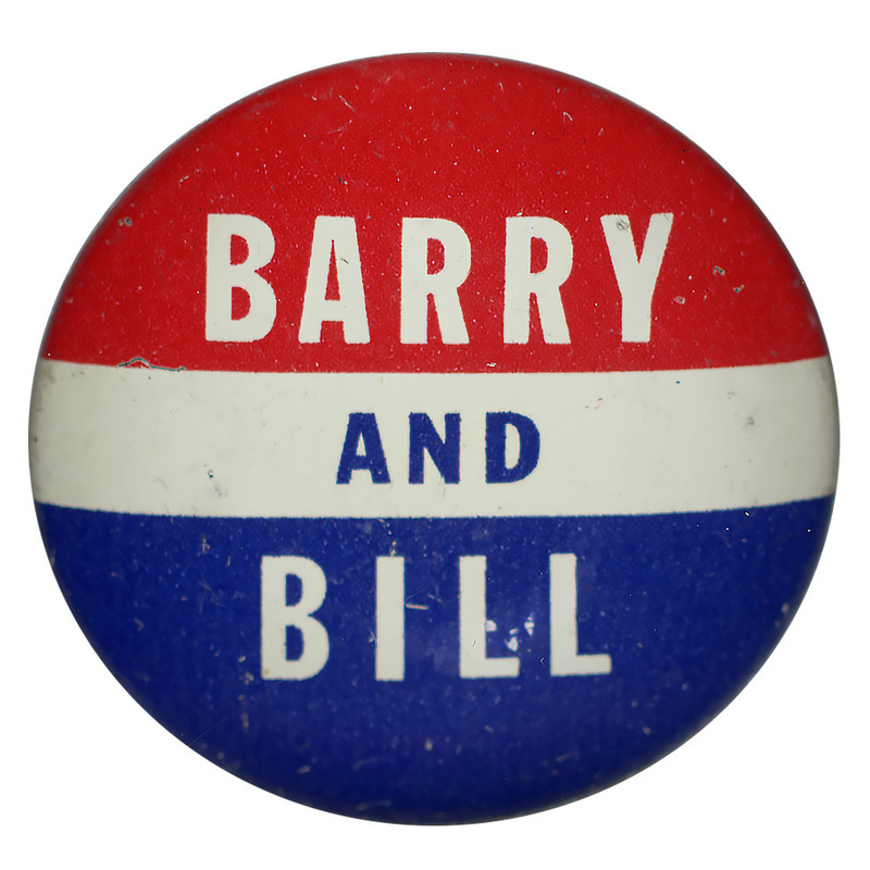 Round button with horizontal stripes of red, white, and blue. White and blue text reads "Barry and Bill" across all three of the stripes. 