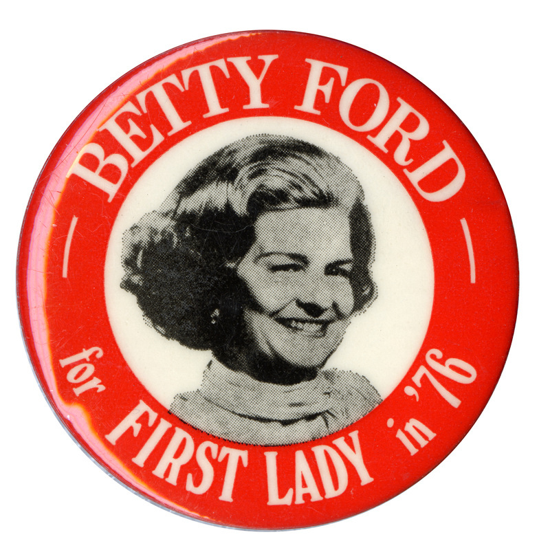 Round, red button with a white circle containing a black and white portrait of Betty Ford. White text around the edge reads "BETTY FORD for FIRST LADY in '76"