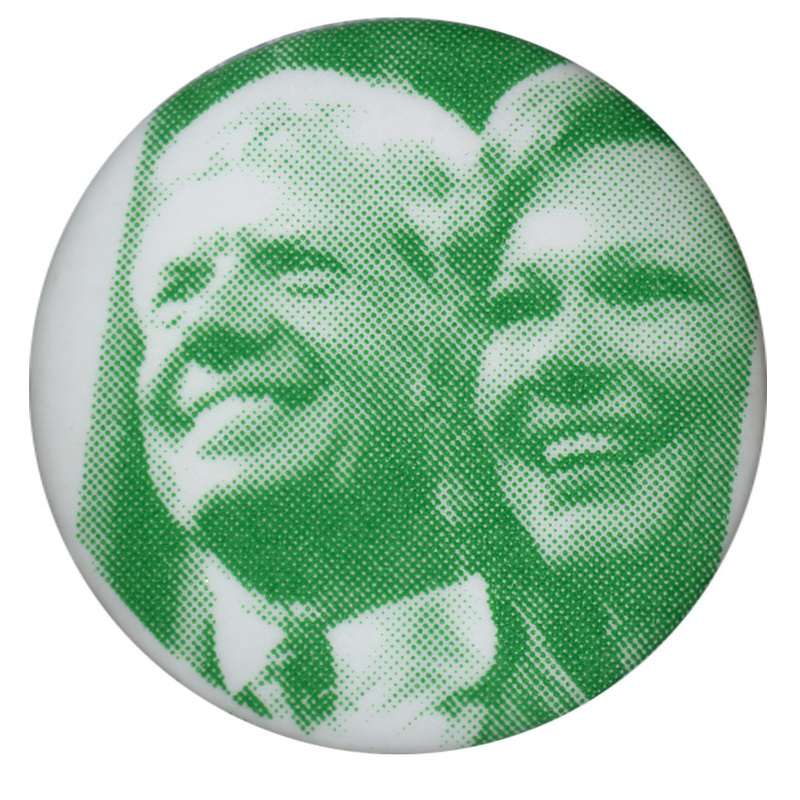 Round, green and white button with a photograph of Jimmy and Rosalynn Carter.