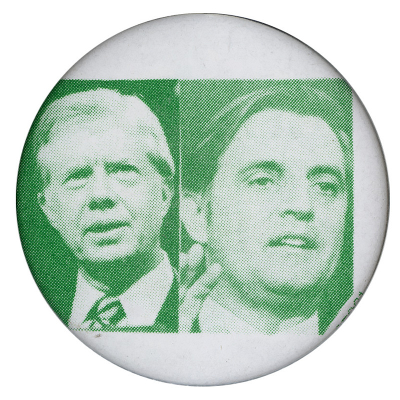 Round, white button with green photographs of Jimmy Carter and Walter Mondale.