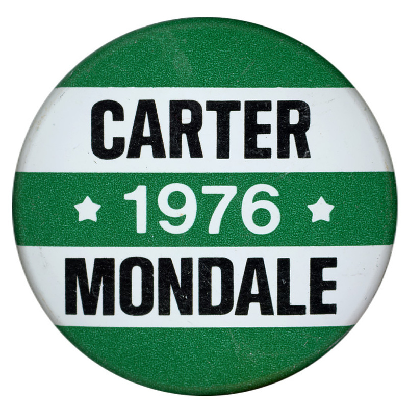 Round, green and white striped button with black and white text reading "CARTER 1976 MONDALE"