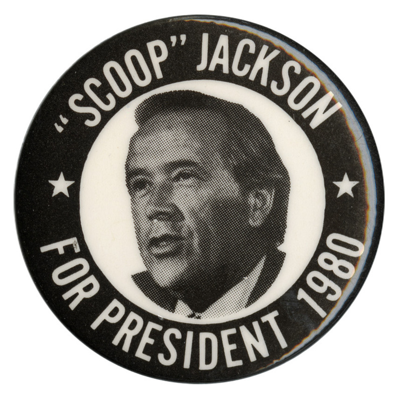 Round, black button with a black and white photograph of Henry "Scoop" Jackson within a white circle. White text reads ""SCOOP" JACKSON FOR PRESIDENT 1980"