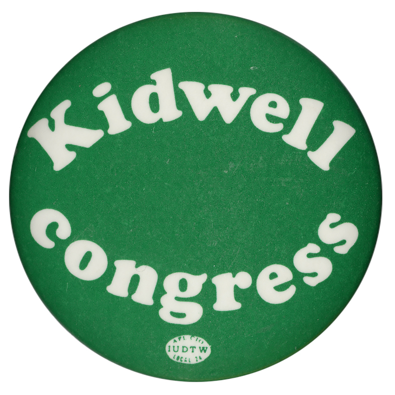 Round, green button with white text reading "Kidwell congress"
