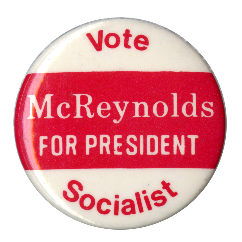 Round, white and red button with red and white text reading "Vote McReynolds FOR PRESIDENT Socialist"