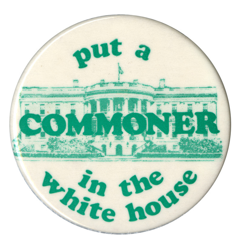 Round, white button with a green image of the White House and green text reading "put a COMMONER in the white house"